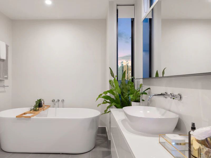 Clean modern bathroom with a white freestanding tub
